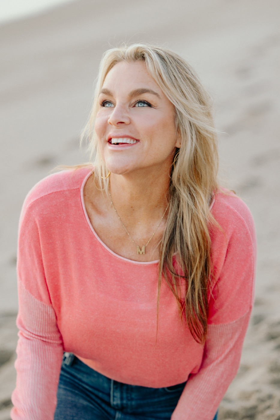 Megan Hutchinson smiling on the beach